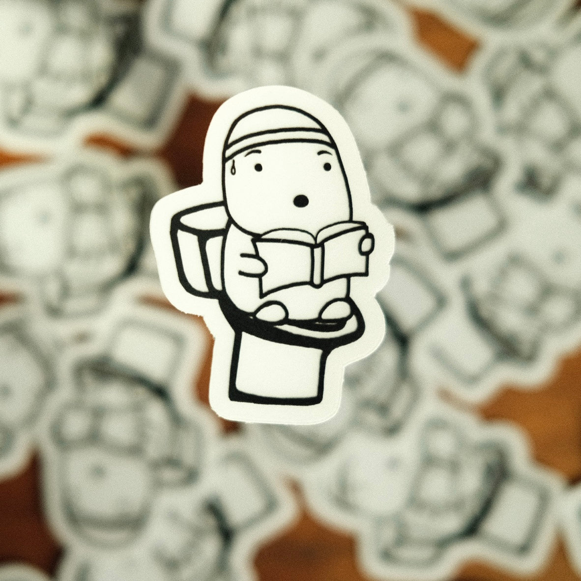 Image of Plumbus Reading on Toilet - Novelbookstore.co
