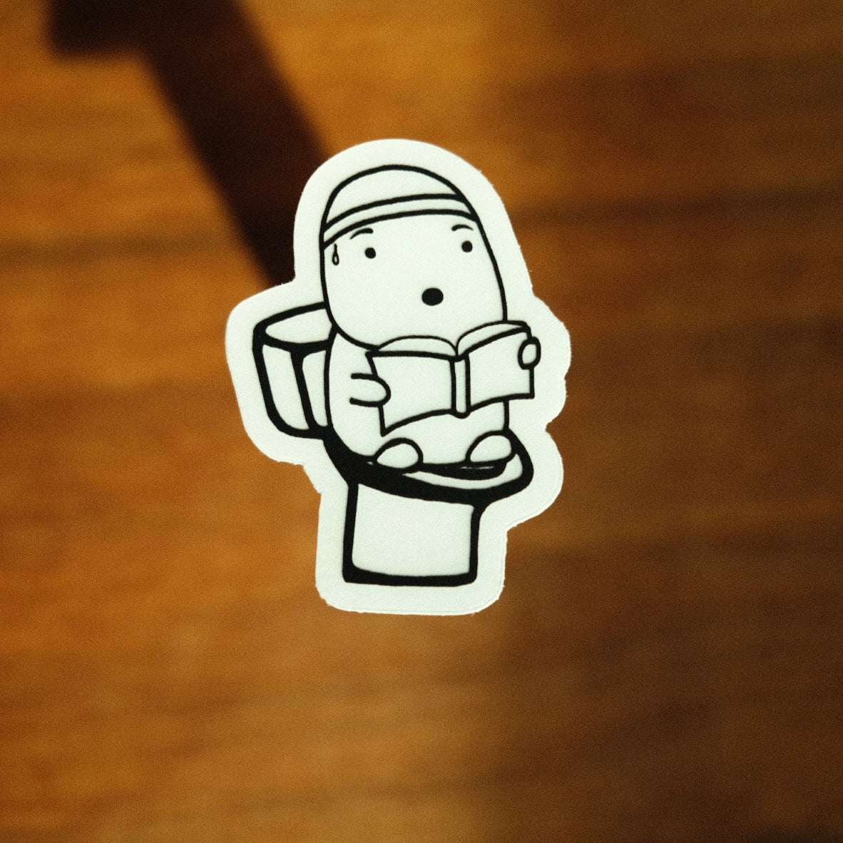 Image of Plumbus Reading on Toilet - Novelbookstore.co