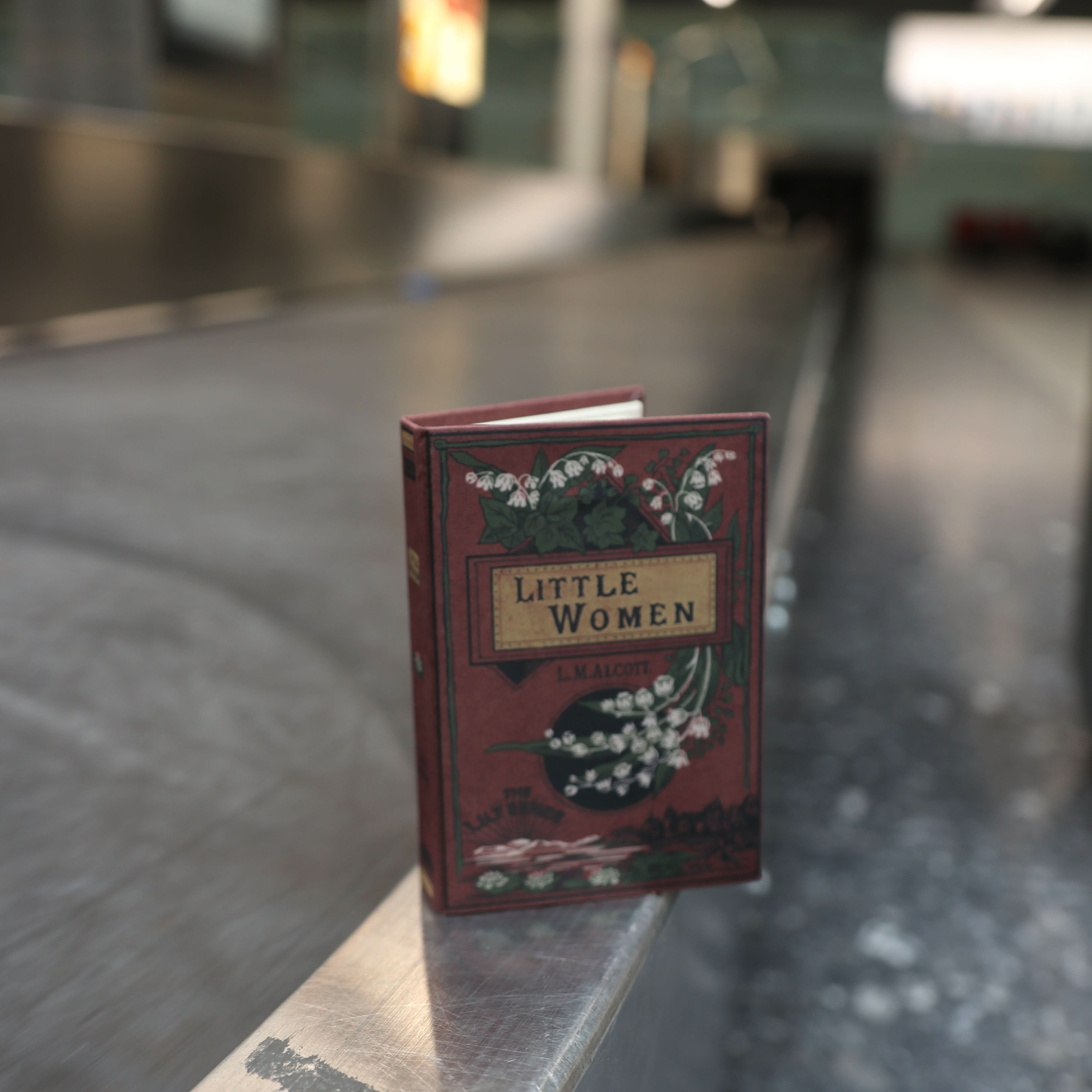 Image of 'Little Women' (Crimson Red) by Louisa May Alcott 1868 Passport/Notebook Wallet - Novelbookstore.co