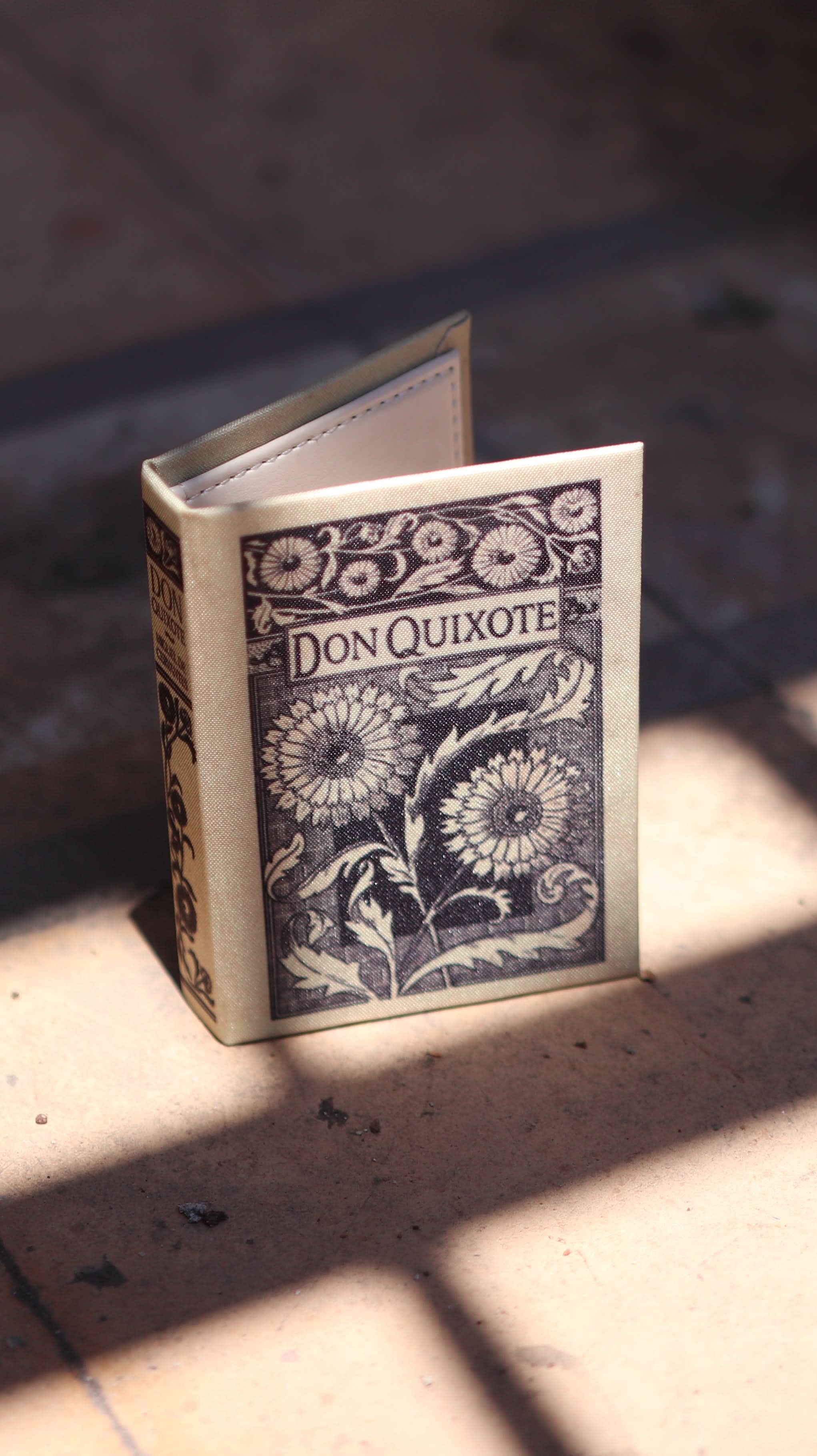 Image of Don Quixote by Miguel de Cervantes 1605 Book Wallet - Novelbookstore.co