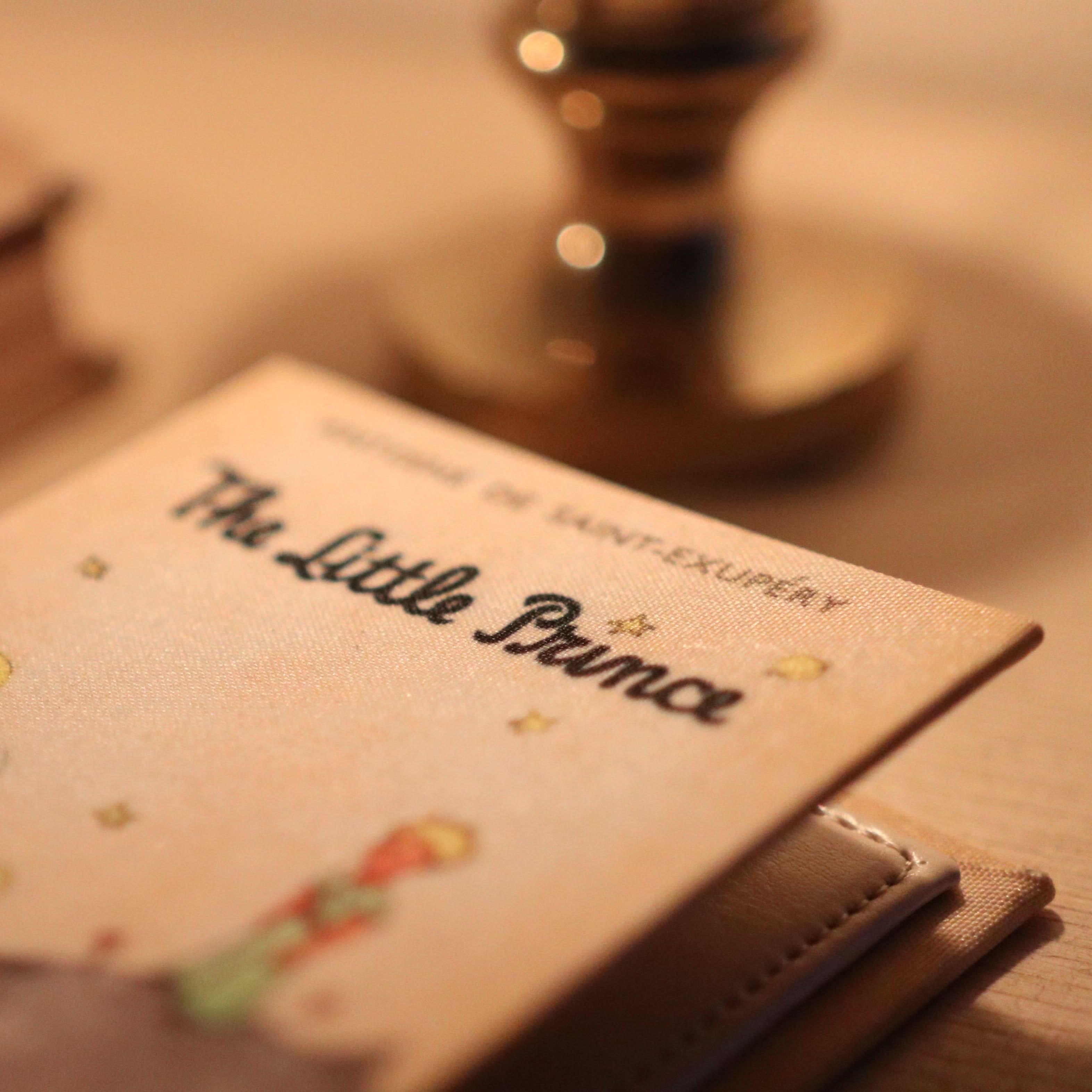 Image of The Little Prince by Antoine de Saint-Exupéry 1943 Book Wallet - Novelbookstore.co